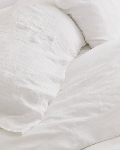 close up of pillows and duvet cover in white hemp bedding
